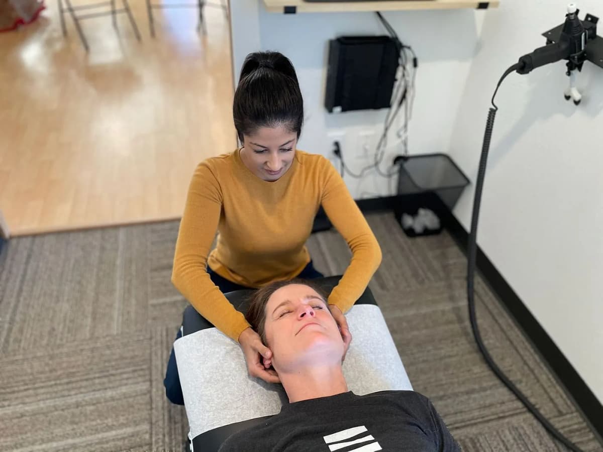 woman receiving migraine treatment at Elevation Spine Center in Bend, Oregon